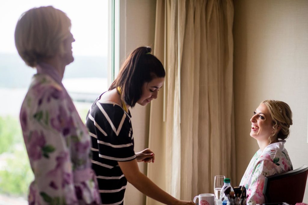 bride getting ready at Statler Hotel at Cornell University