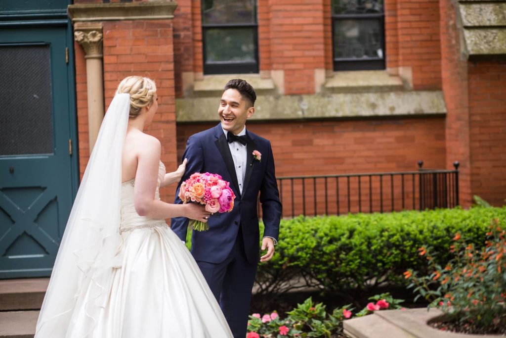 groom sees bride for the first time on the wedding day at Cornell University