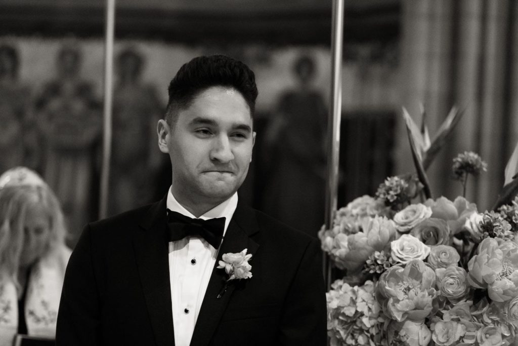 groom awaits his bride